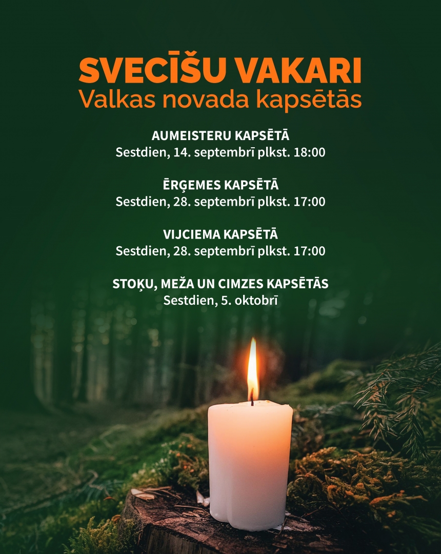Iedegta svecīte uz zaļa fona