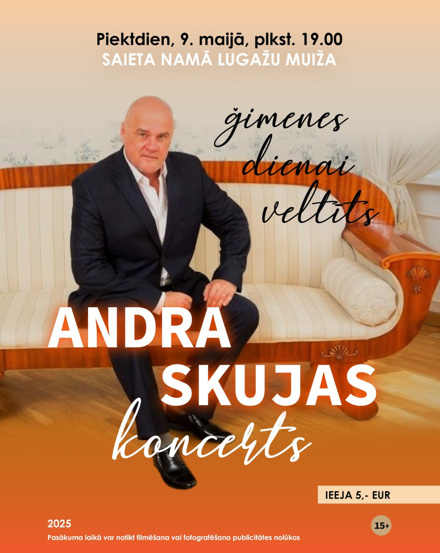Vīrietis uzvalkā sēž uz dīvāna
