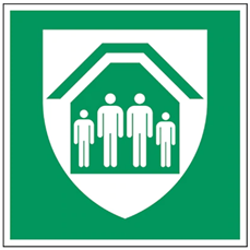 Zaļa zīme ar cilvēku siluetiem zem nojumes