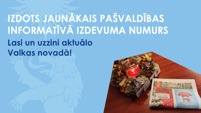 Zils baneris ar Valkas ģerboņa lāci un jaunās avīzes fotogrāfiju ar sveci