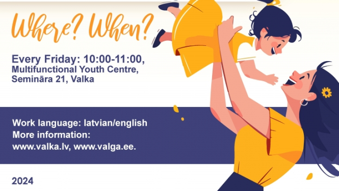 A smiling mother lifting up her young daughter